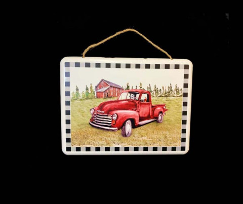 RED TRUCK WITH DOG WALL WITH WHITE AND BLACK TRIM AND HANGING ROPE