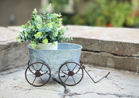 GALV. TIN WHEELBARROW WITH BROWN WHEELS